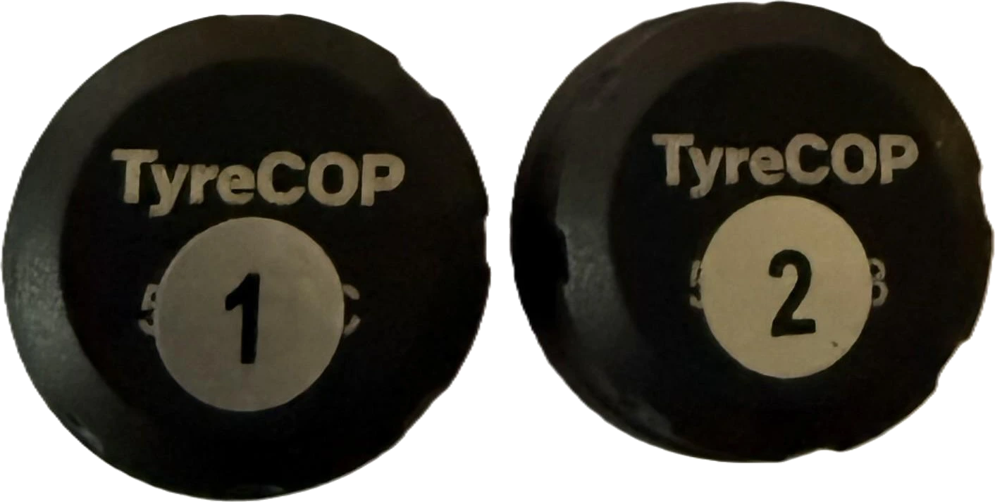 A pair of TyreCOP motorcycle valve sensors, decalled 1 for the front tyre and 2 for the rear